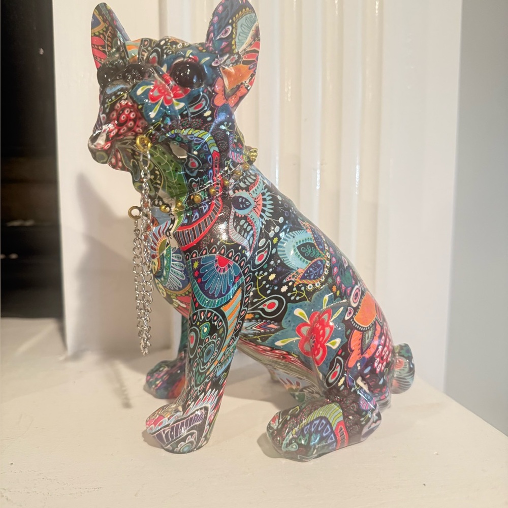 Two Colorful Patterned Dog Figurines